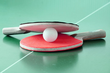 Ping-pong rackets and a ball