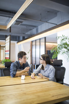 IT workers developing digital tablet