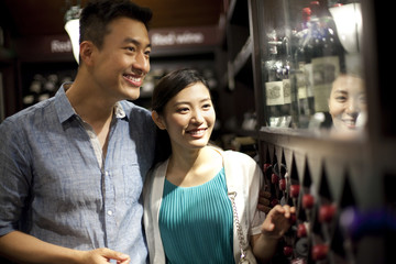 Young couple shopping in cellar