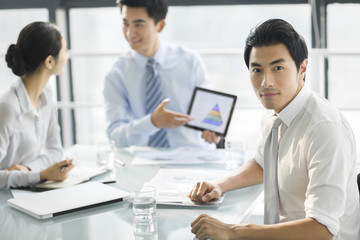 Portrait of young businessman in office