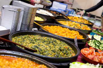 fresh food on display on a buffet table