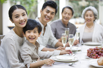 Family eating holiday meal together