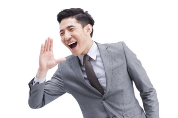 Confident young businessman shouting