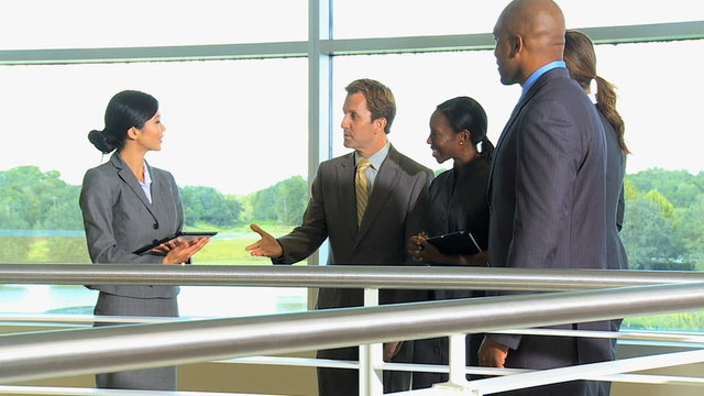 handshake multi ethnic male female business city investment corporate tablet