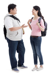 Young college couple in discussion