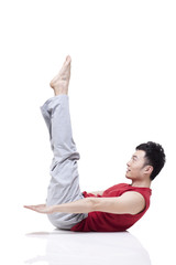 Young man doing yoga