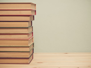 Books on a wooden shelf