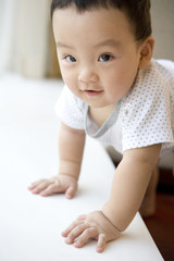 Fototapeta premium Infant looking at camera