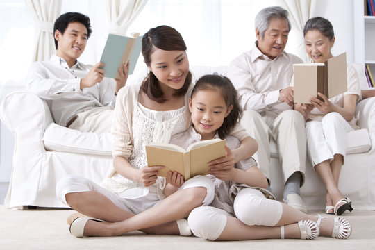 Happy family reading together