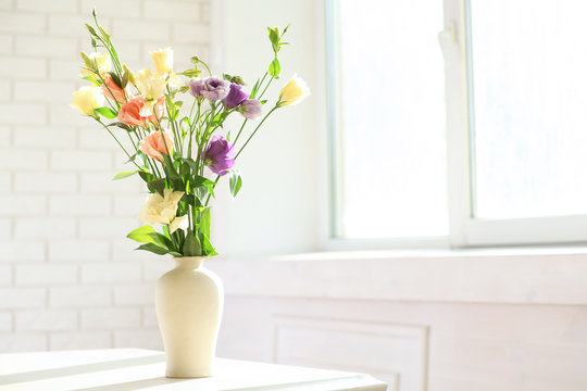 Beautiful Spring Flowers In Vase On Window Background