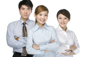 Fototapeta premium Young businessman and businesswoman standing together, arms crossed