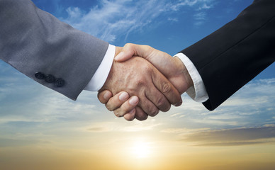 Business people handshaking.