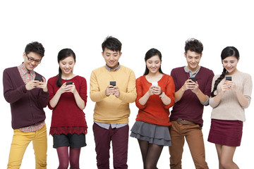 Obraz premium Young friends with smart phones in Chinese New Year