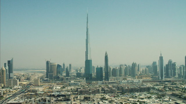 Aerial Dubai Skyline Burj Khalifa Skyscraper Highway desert UAE