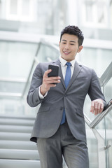 Businessman using smart phone