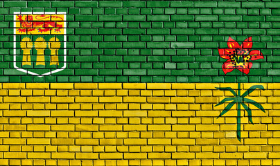 flag of Saskatchewan painted on brick wall