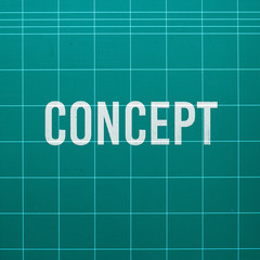 Concept word on cutting mat