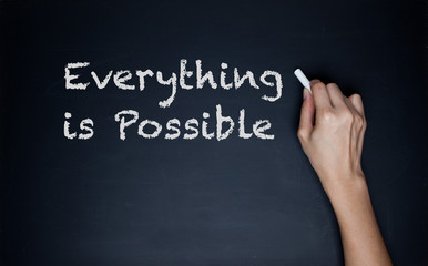 words "Everything is possible" written on blackboard