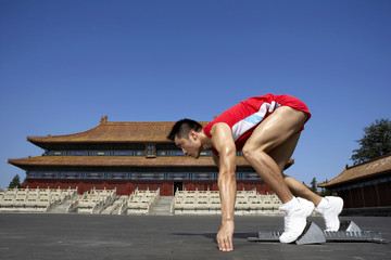 Portrait Of Athlete In Front Of Temple