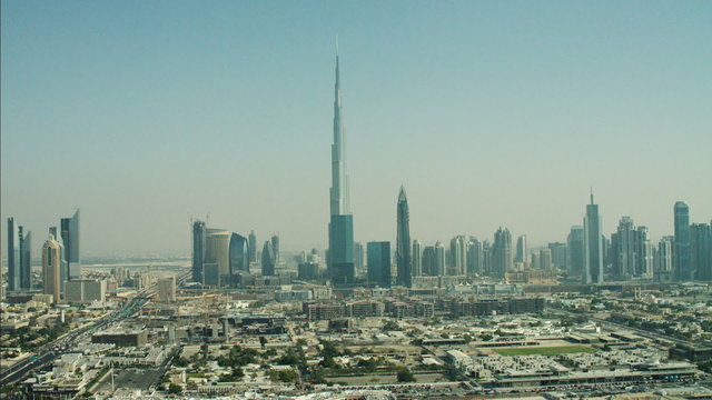 Aerial Dubai Skyline Burj Khalifa Skyscraper Highway desert UAE