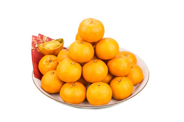 Mandarin oranges,  gold nuggets, red packets with good luck character