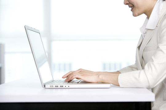 Office Worker Using Her Computer