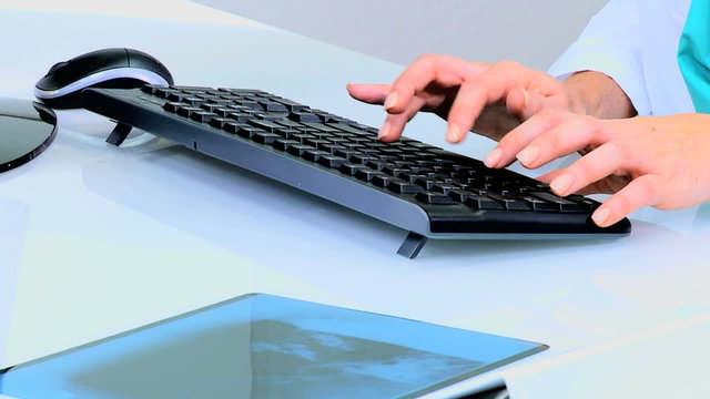 hands female Caucasian European healthcare business computer x-ray technology