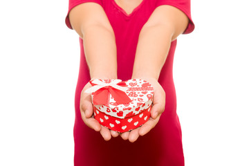 red Heart in hands.  isolated on white