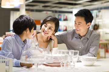Cheerful family face to face talking