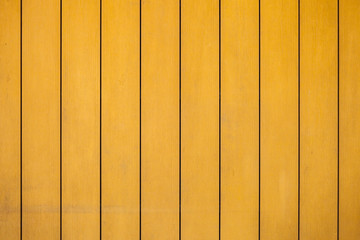 yellow wooden plank as a background or texture