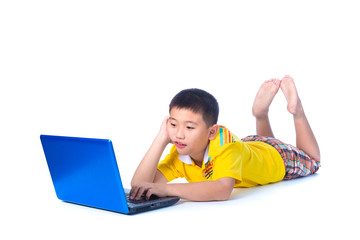 Asian child using a laptop, on white background, isolated