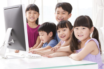Children using computer at home