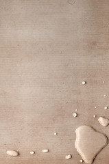 splash drops on carton piece of paper
