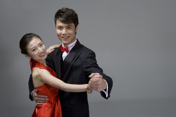 Young couple ballroom dancing
