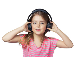 Child girl smiling in earphones isolated on white.