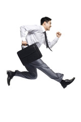 Businessman jumping in the air