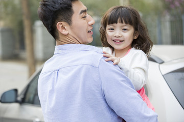 Happy father and daughter