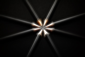 Set of black pencils on black background, large abstract paintin