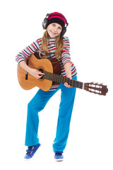 The girl in headphones with a guitar.
