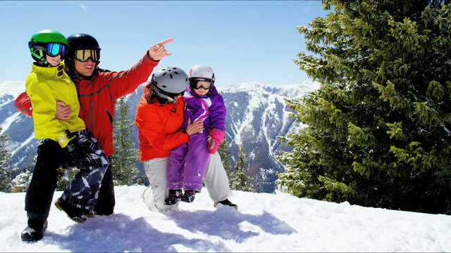 snow outdoor active lifestyle Caucasian family travel promotion winter vacation
