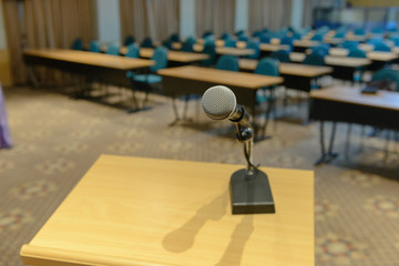 Microphone on podium in empty conference room