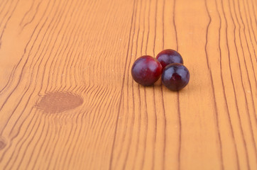 Fresh grape on wooden table.