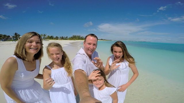Social media portrait of happy Caucasian family on beach vacation 