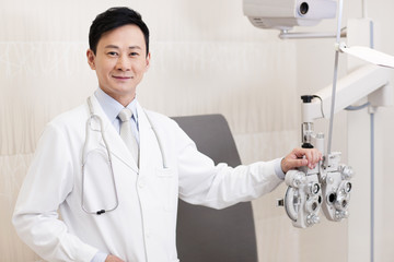 Doctor and medical equipment for eyes checking