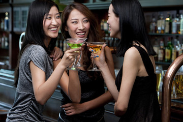 Friends Relaxing at a Bar
