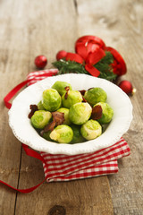 Brussel sprouts with fried bacon and butter