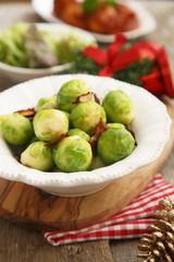 Brussel sprouts with fried bacon and butter
