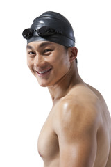 Muscular swimmer smiling