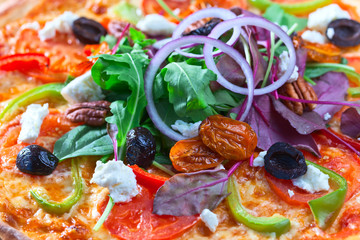 vegan pizza with onion and arugula