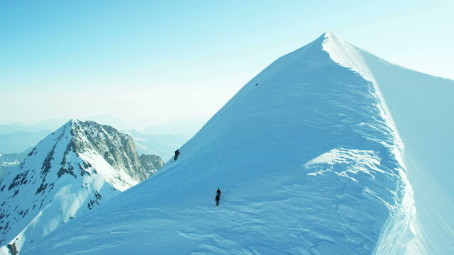 Aerial Switzerland Monch climbers mountain Alps snow travel